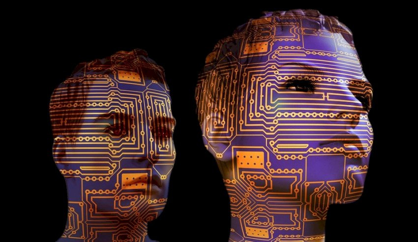 Male and female mannequins with computer circuitry superimposed